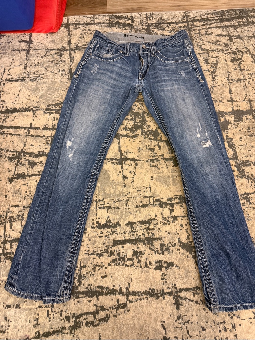 Men’s Buckle Black Distressed Blue Denim Jeans
